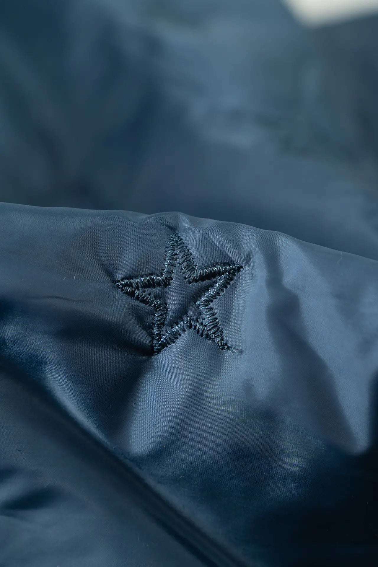 Padding acolchado estrella azul