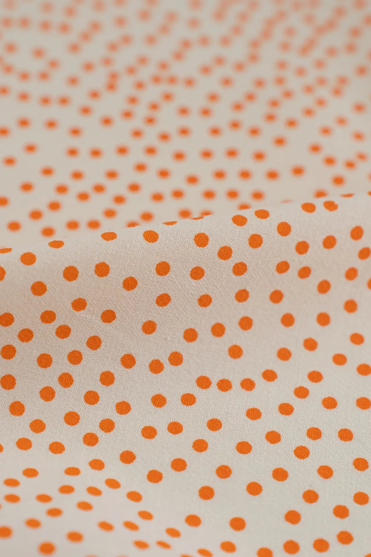 Estampado de lunares naranja
