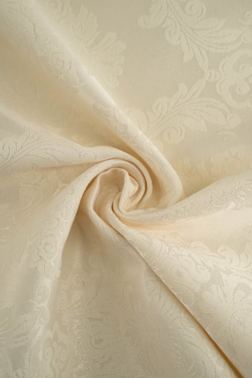 Tela color cruda con estampado