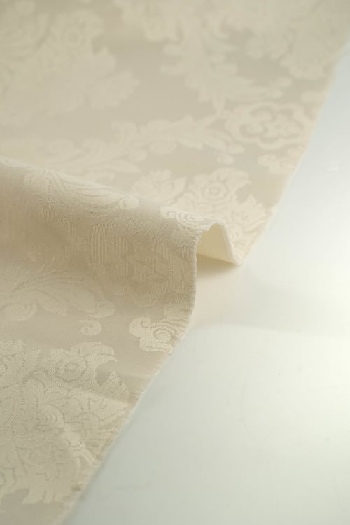 Tela color cruda con estampado