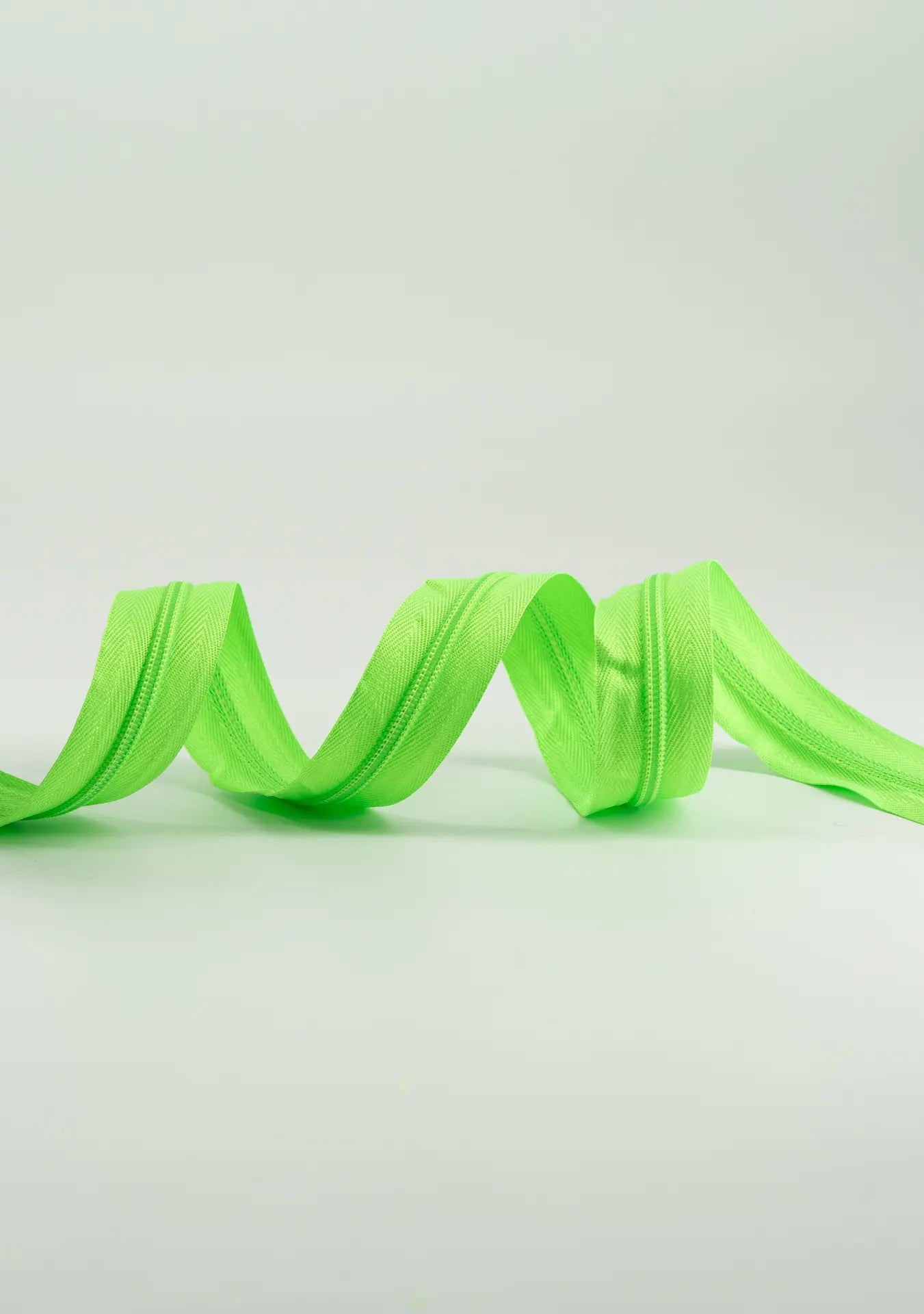 Cremallera continua verde fluor