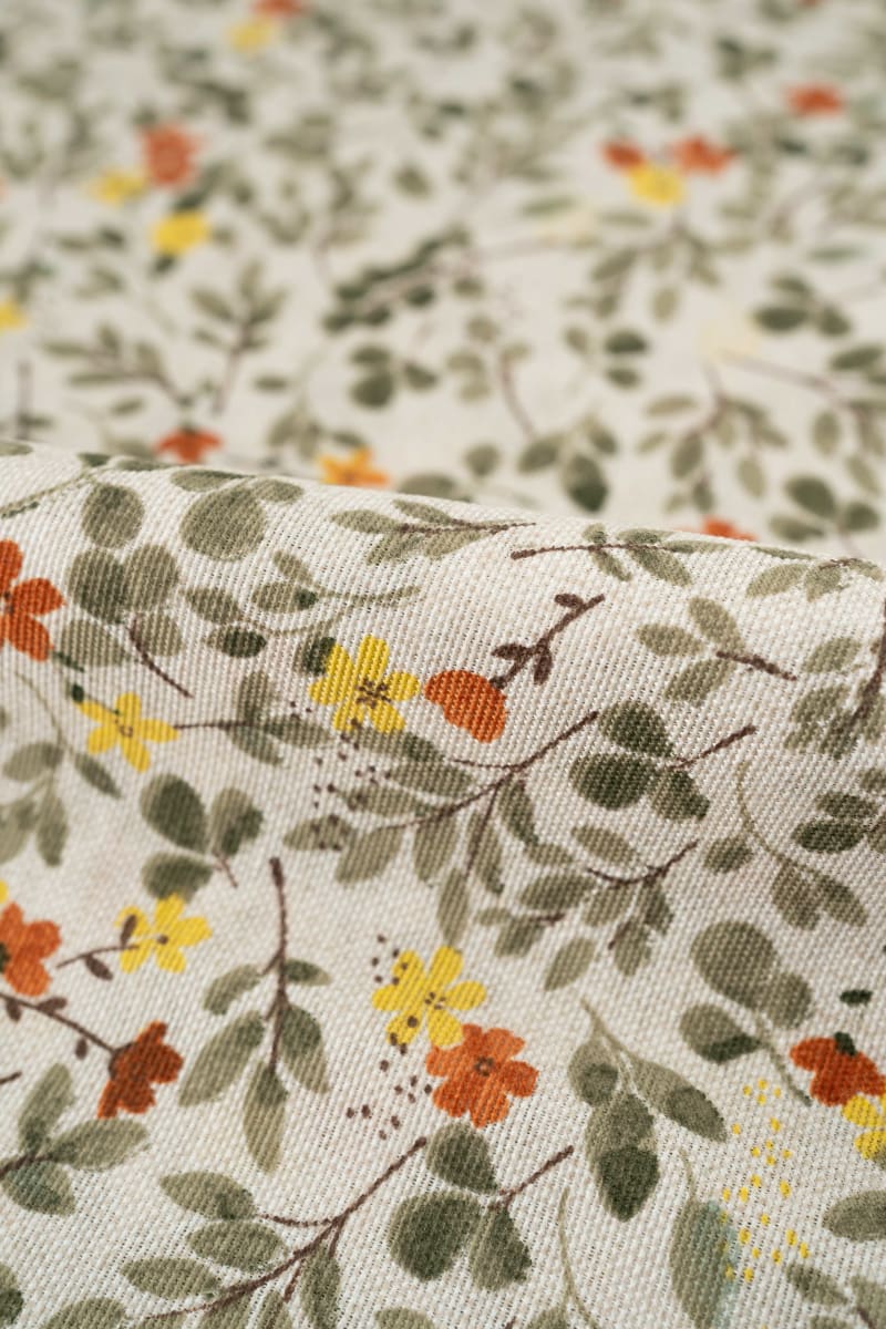 Loneta estampado flores naranja y amarillo mostaza