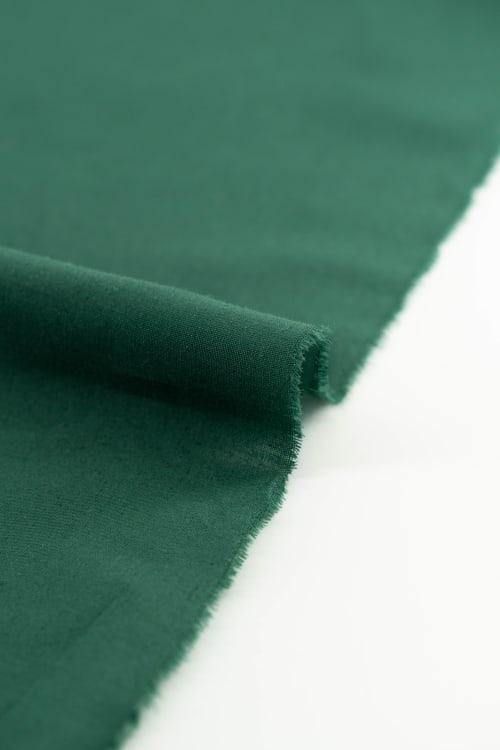 Popelin color verde oscuro 
