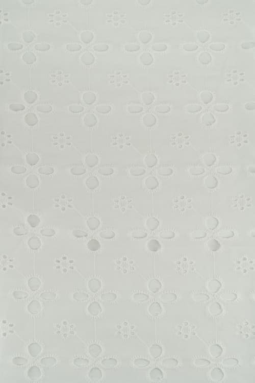Perforado algodón blanco surat