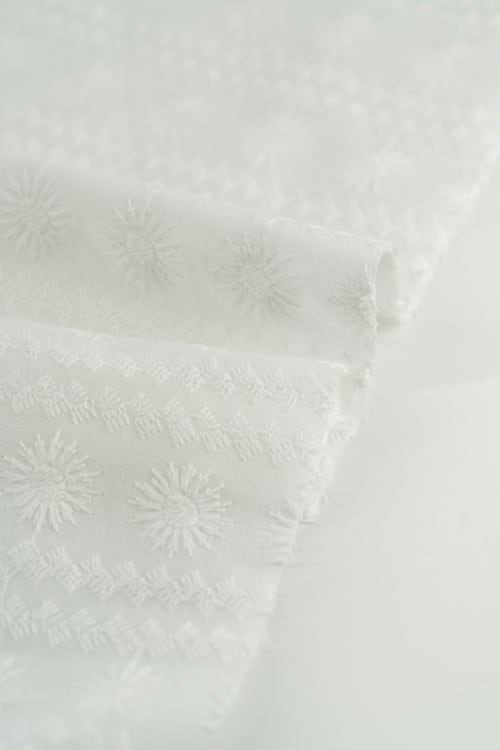 Perforado algodon blanco retama