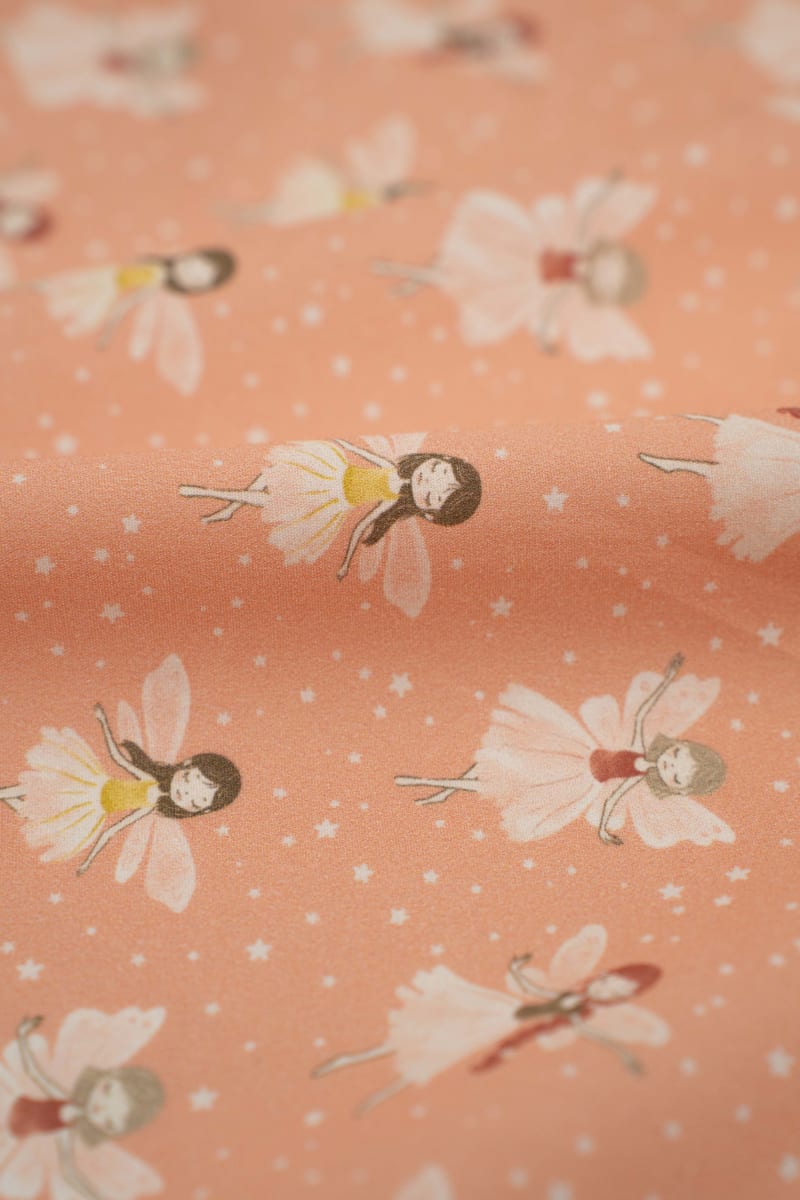 Tejido infantil con estampado de hadas