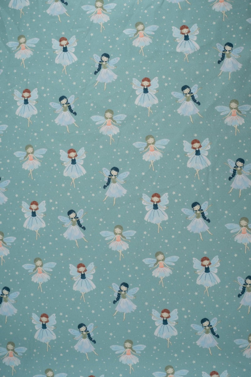 Tejido infantil con estampado de hadas