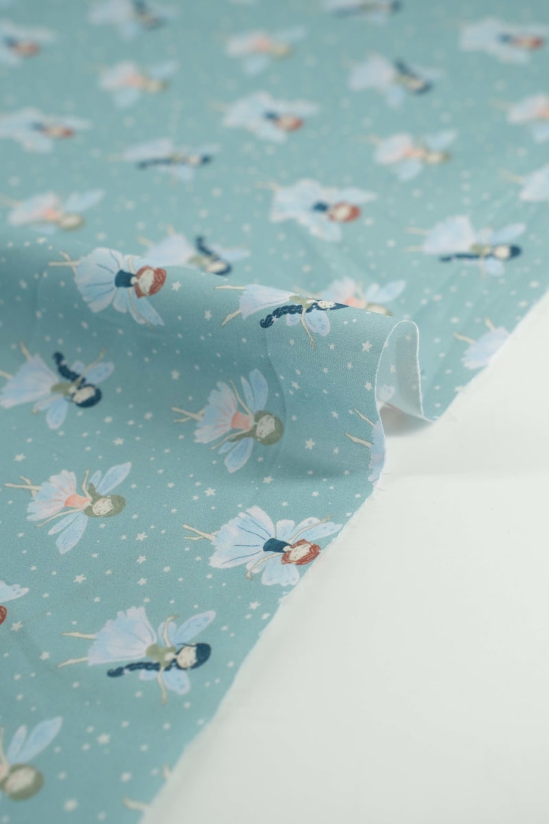 Tejido infantil con estampado de hadas