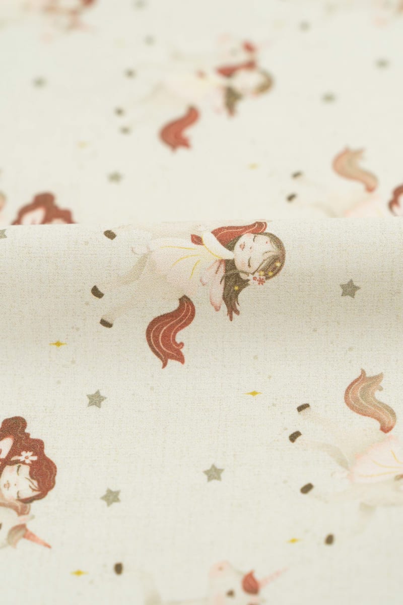 Tejido infantil con estampado de unicornios
