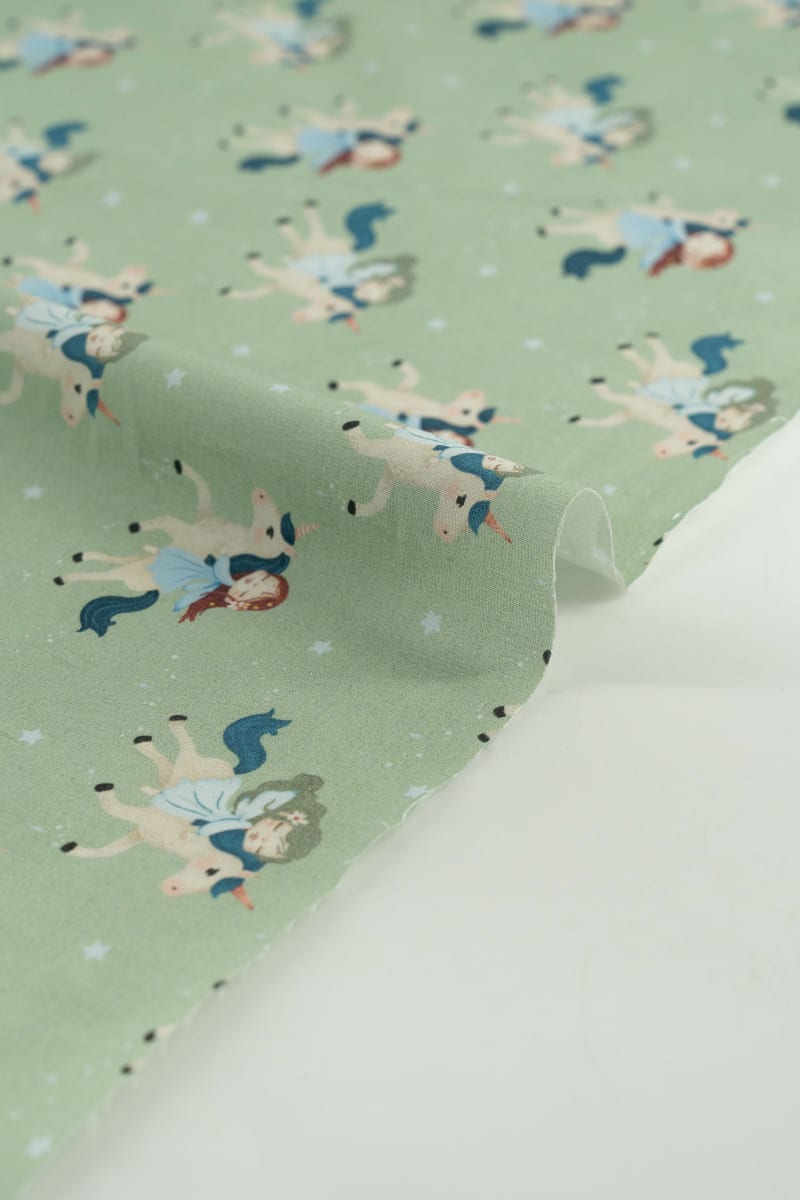 Tejido infantil con estampado de unicornios