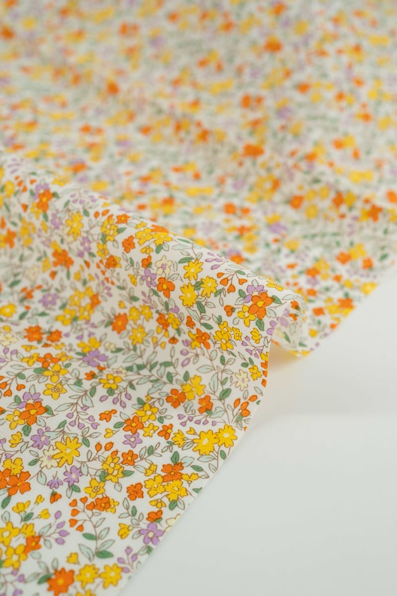 Popelín floral flores liberty naranja