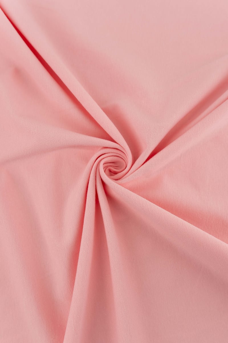 tela de punto de algodón en color rosa bebé