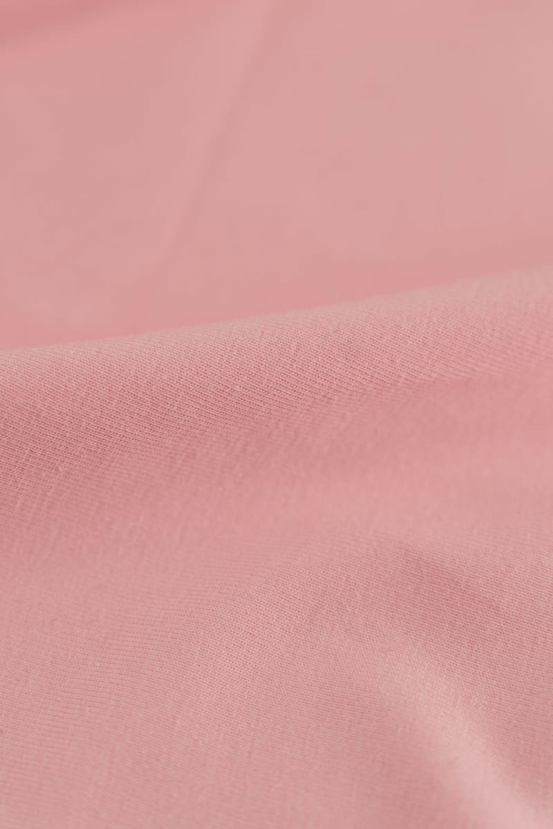 tela de punto de algodón en color rosa bebé
