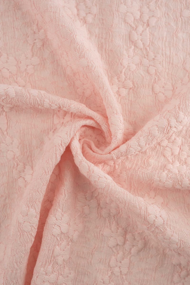 Punto floral rosa claro
